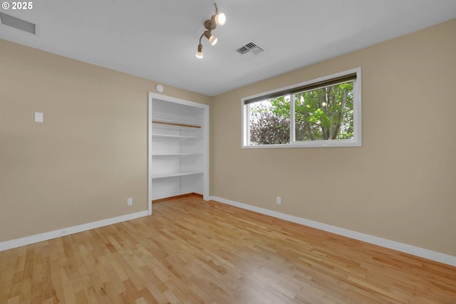 2720 Taylor St, Eugene, OR 97405 - unfurnished bedroom featuring visible vents, light wood-style floors, and baseboards