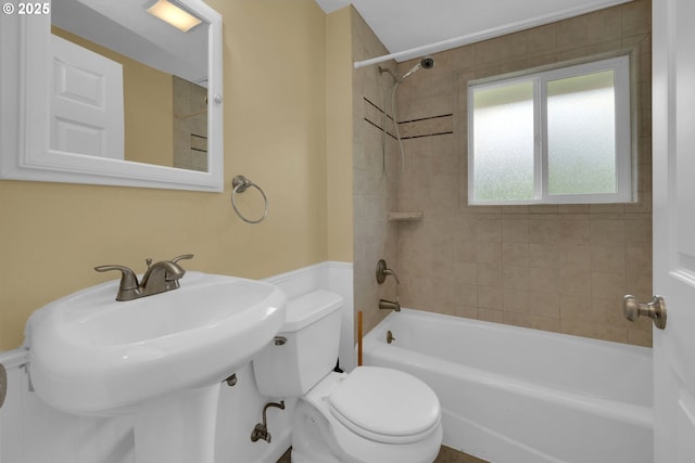 2720 Taylor St, Eugene, OR 97405 - bathroom with a sink, shower / bathtub combination, toilet, and a wainscoted wall