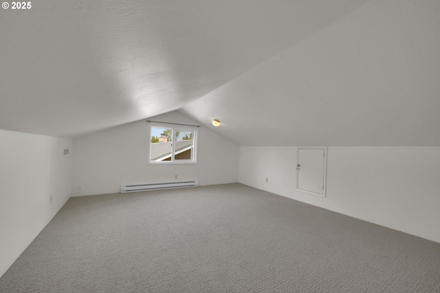 2720 Taylor St, Eugene, OR 97405 - bonus room with carpet flooring, lofted ceiling, and a baseboard radiator