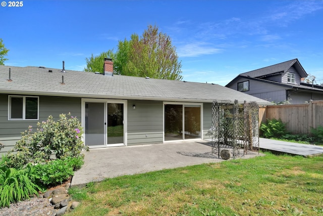 2720 Taylor St, Eugene, OR 97405 - back of house featuring fence, a patio, a chimney, and a yard