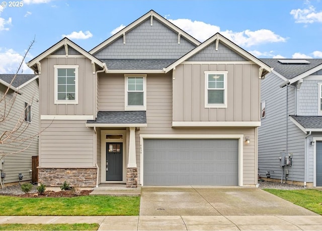 craftsman-style house featuring a garage