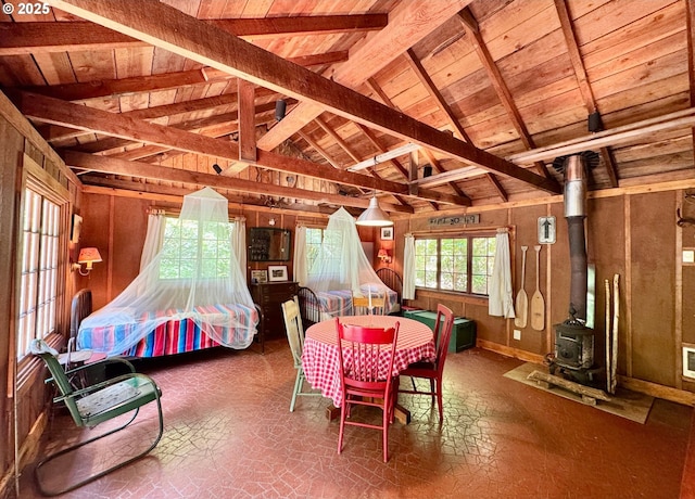 26015 NE Lucia Falls Rd, Yacolt, WA 98675 - dining space with wooden ceiling and a wood stove