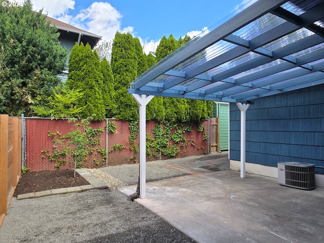 4145 SE Grant St, Portland, OR 97214 - fenced backyard featuring cooling unit, a pergola, and a patio