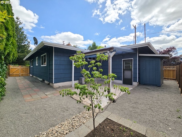 4145 SE Grant St, Portland, OR 97214 - view of front of house featuring a patio area and a gate
