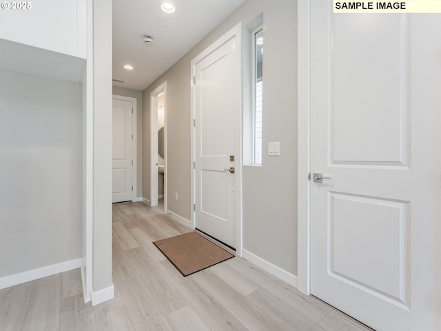 908 NW 178th Way, Ridgefield, WA 98642 - foyer entrance with light wood-type flooring, recessed lighting, and baseboards