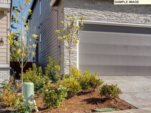908 NW 178th Way, Ridgefield, WA 98642 - view of home's exterior featuring stone siding and fence