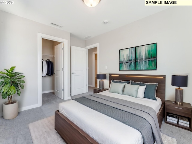 908 NW 178th Way, Ridgefield, WA 98642 - carpeted bedroom with baseboards, a walk in closet, and a closet