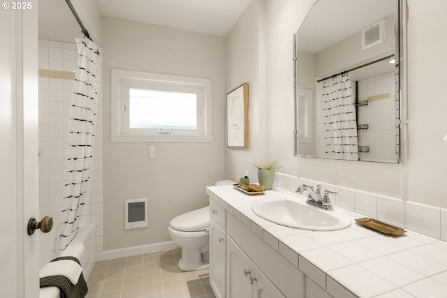 6416 NE 23rd Ave, Portland, OR 97211 - bathroom with vanity, heating unit, tile patterned flooring, and shower / bath combination with curtain
