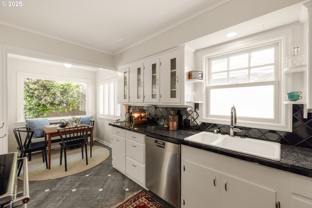 6416 NE 23rd Ave, Portland, OR 97211 - kitchen featuring stainless steel dishwasher, open shelves, dark countertops, white cabinets, and tasteful backsplash