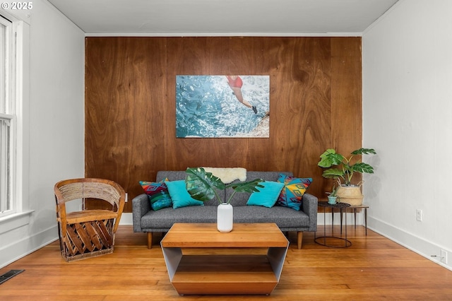 living area featuring hardwood / wood-style floors