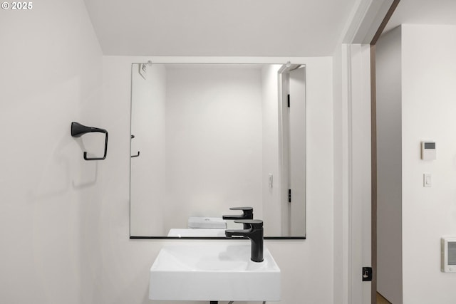 bathroom featuring toilet and sink