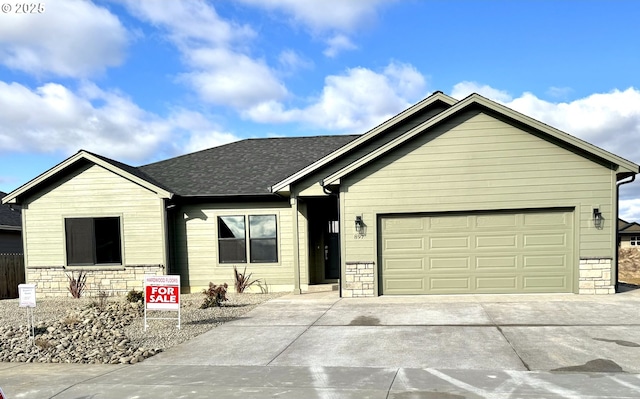 view of front of home featuring a garage