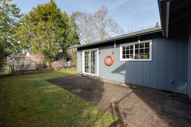 exterior space featuring a patio and a lawn