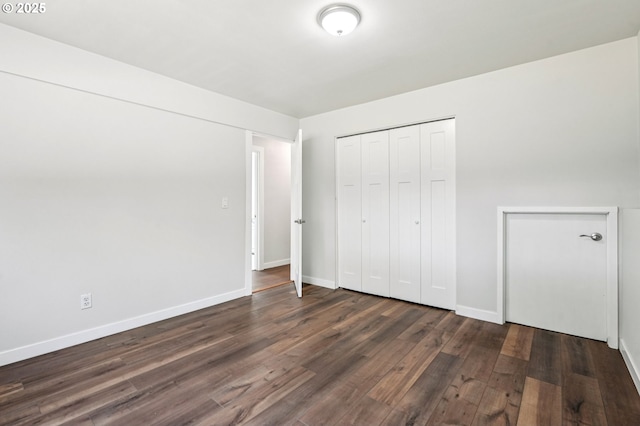 704 SE 207th Ave, Gresham, OR 97030 - unfurnished bedroom with dark wood-style floors and a closet