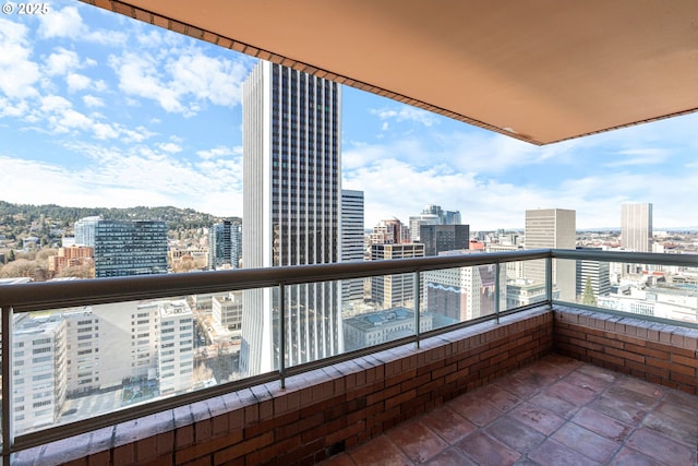 balcony featuring a city view