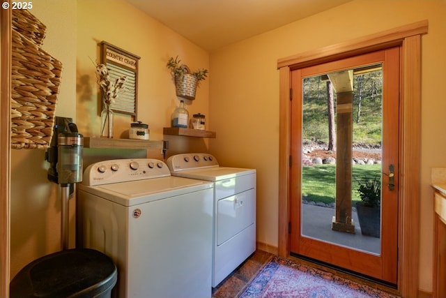 laundry room featuring washer and clothes dryer