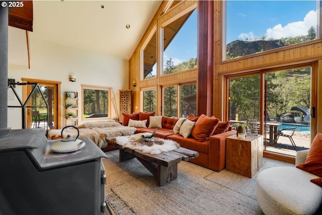 sunroom / solarium featuring lofted ceiling