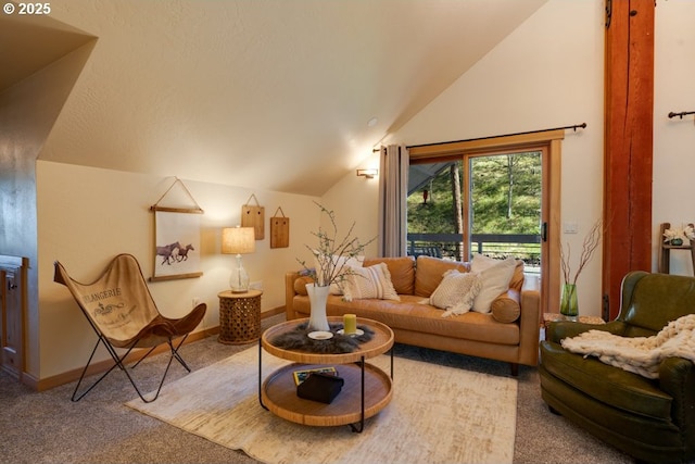 carpeted living room featuring vaulted ceiling