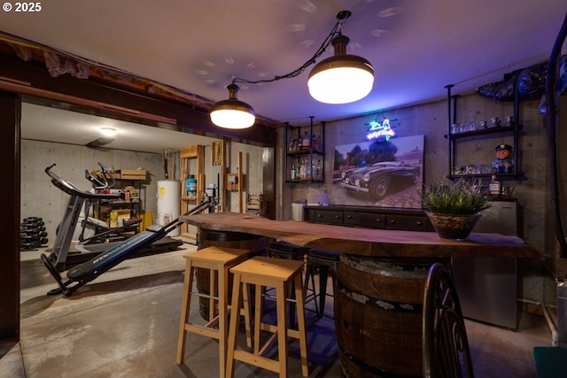 bar with concrete flooring and water heater