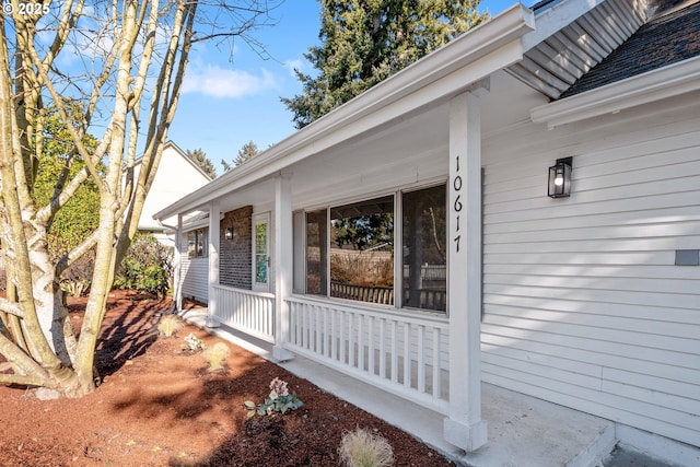 doorway to property featuring a porch