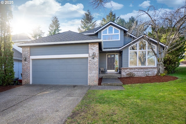 view of front of home featuring a garage and a front lawn