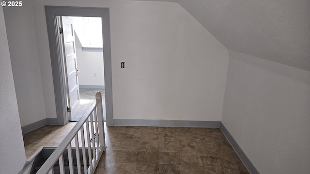 708 W Fourth Plain Blvd, Vancouver, WA 98660 - bonus room featuring lofted ceiling, baseboards, and stone finish floor