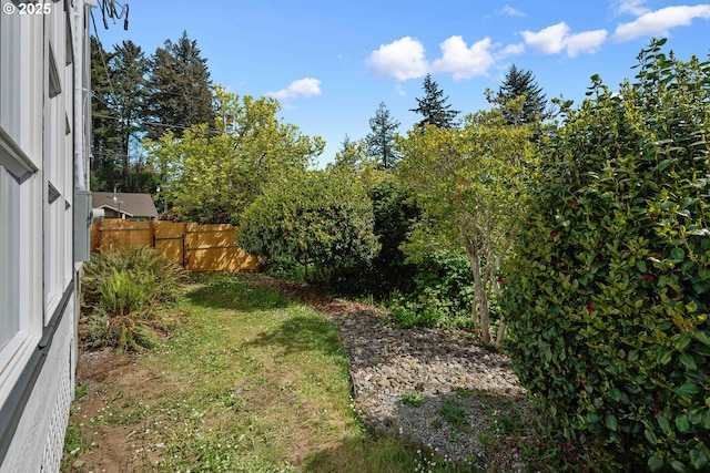 view of yard featuring fence