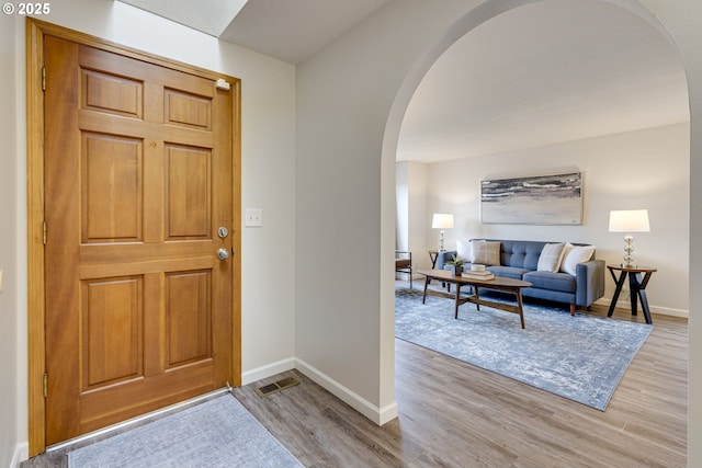 foyer entrance featuring light wood-type flooring