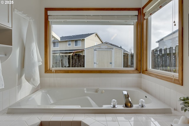 bathroom with tiled tub