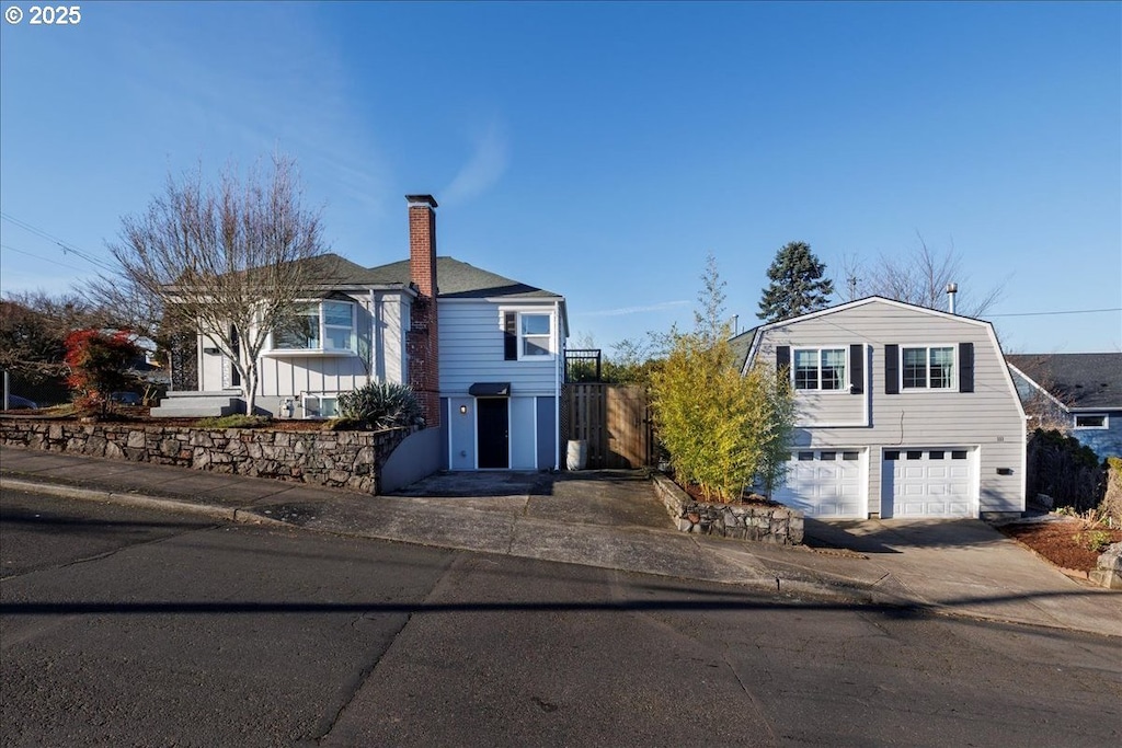 front of property with a garage