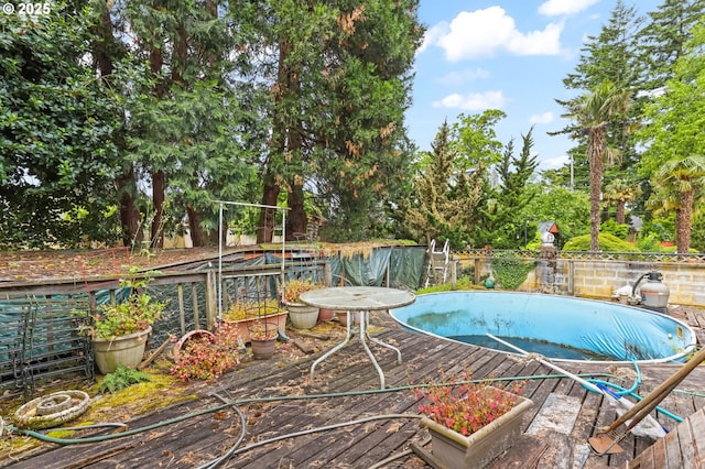 3235 NE 65th Ave, Portland, OR 97213 - view of pool featuring a deck and view of scattered trees