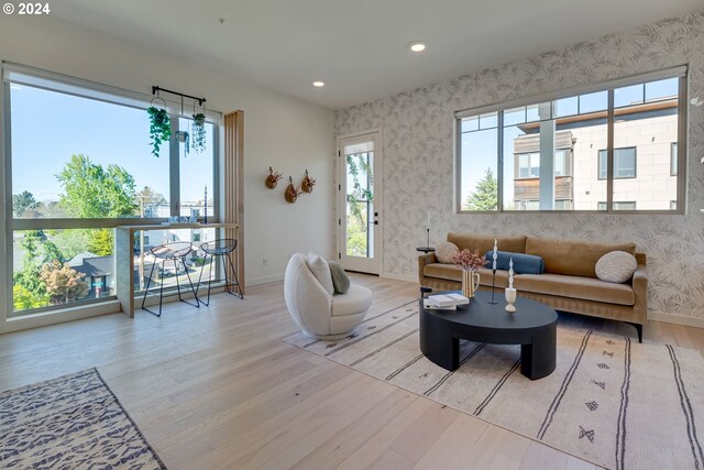 living room with light hardwood / wood-style flooring