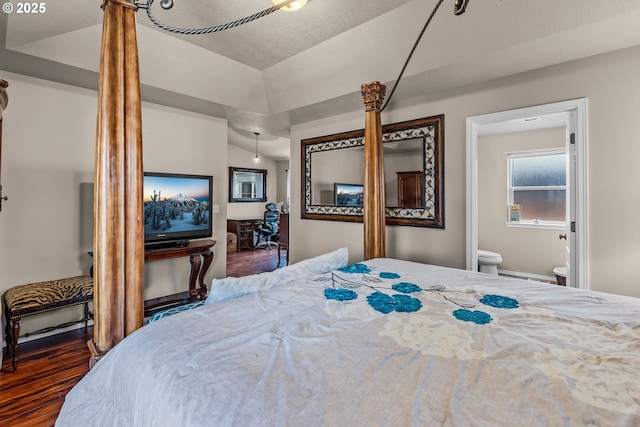 719 NE Quince Ave, Redmond, OR 97756 - bedroom with wood finished floors and connected bathroom