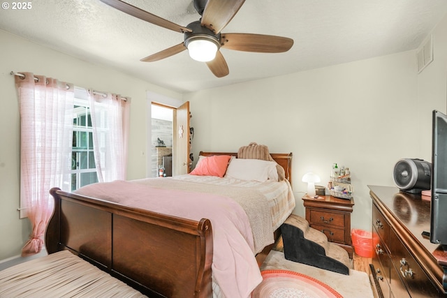2472 Willamina Ave, Forest Grove, OR 97116 - bedroom featuring a ceiling fan and wood finished floors