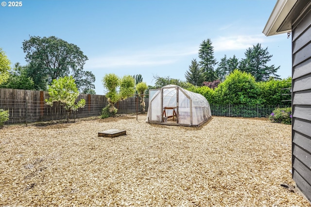 2472 Willamina Ave, Forest Grove, OR 97116 - fenced backyard featuring an exterior structure and an outdoor structure