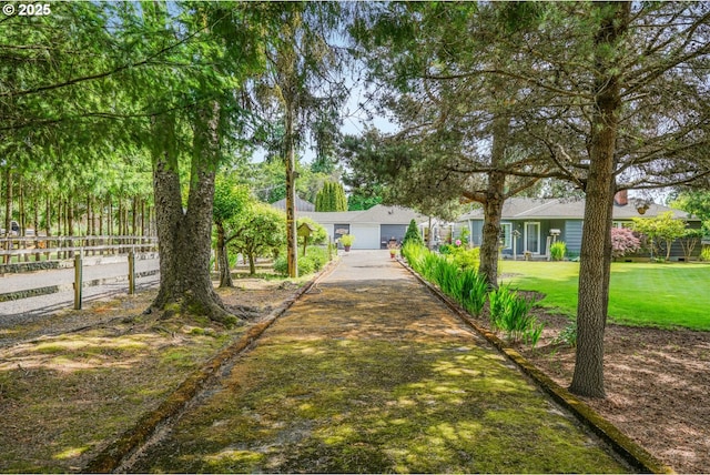 2472 Willamina Ave, Forest Grove, OR 97116 - view of yard featuring a detached garage and concrete driveway