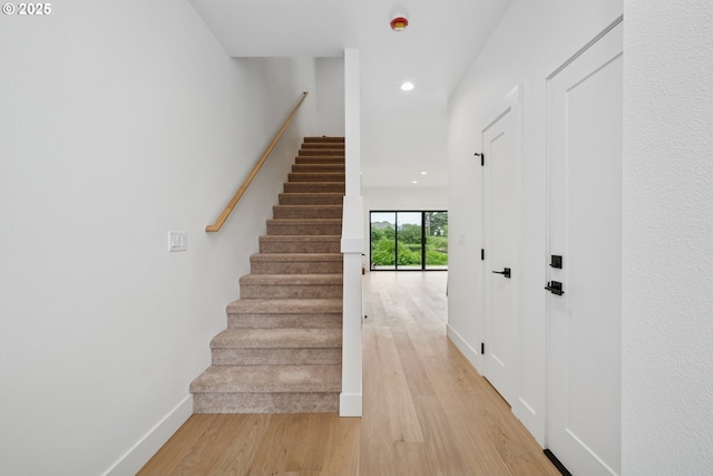 42 Washington St, Rockaway Beach, OR 97136 - stairway with recessed lighting and wood finished floors