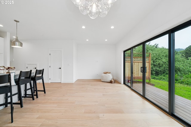 42 Washington St, Rockaway Beach, OR 97136 - unfurnished dining area featuring a chandelier, light wood-style floors, and recessed lighting