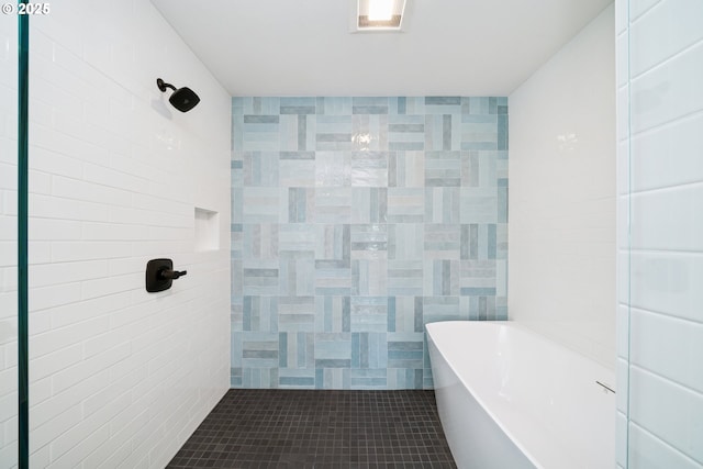 42 Washington St, Rockaway Beach, OR 97136 - full bathroom with a freestanding tub, tile walls, a tile shower, and tile patterned floors