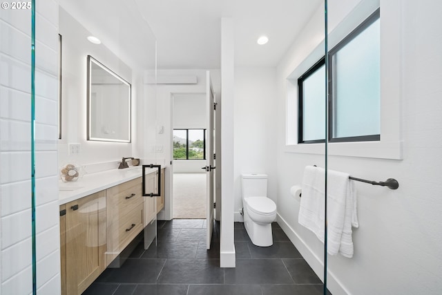 42 Washington St, Rockaway Beach, OR 97136 - bathroom featuring vanity, tile patterned flooring, and recessed lighting