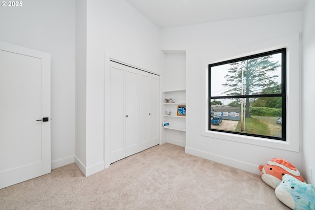 42 Washington St, Rockaway Beach, OR 97136 - unfurnished bedroom featuring carpet flooring and a closet