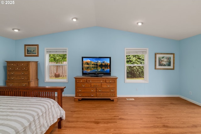 4545 SW Poplar Ln, Portland, OR 97225 - bedroom with vaulted ceiling and wood finished floors