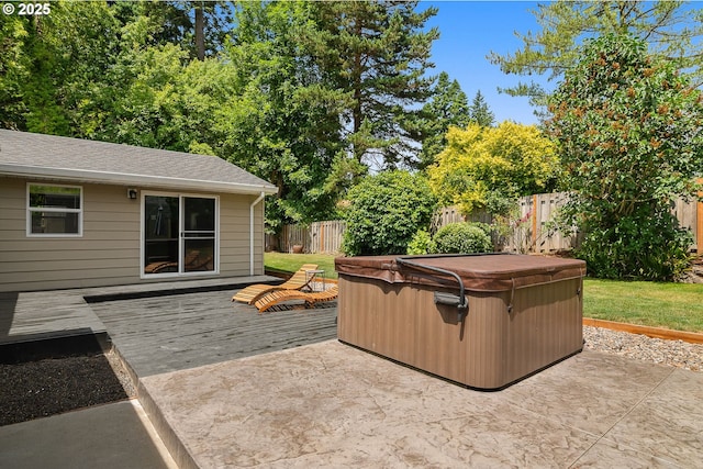 4545 SW Poplar Ln, Portland, OR 97225 - fenced backyard featuring a hot tub, a deck, and a patio