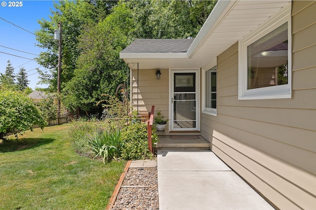 4545 SW Poplar Ln, Portland, OR 97225 - view of exterior entry with a shingled roof