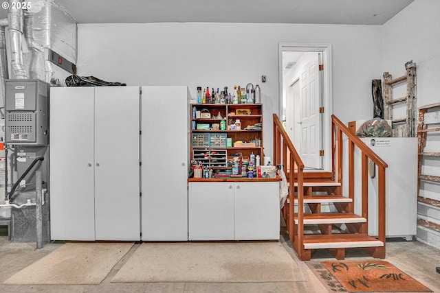 12459 SE Imperial Crest St, Happy Valley, OR 97086 - garage with refrigerator
