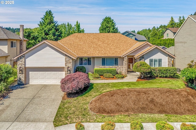 12459 SE Imperial Crest St, Happy Valley, OR 97086 - view of front of house featuring a garage, driveway, brick siding, and a front yard