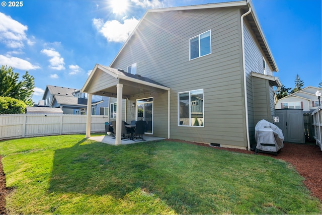 6916 NE 104th Way, Vancouver, WA 98686 - rear view of house featuring a fenced backyard, a patio, a lawn, and crawl space