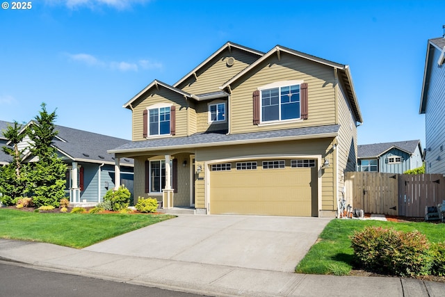 6916 NE 104th Way, Vancouver, WA 98686 - craftsman house with concrete driveway, an attached garage, fence, and a front yard