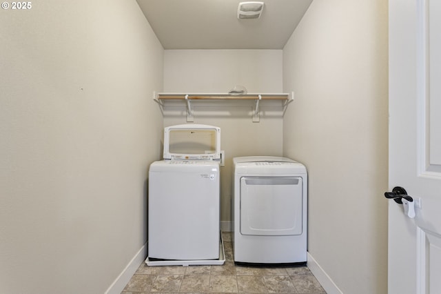 521 NE 77th Ave, Hillsboro, OR 97124 - laundry room with separate washer and dryer and baseboards