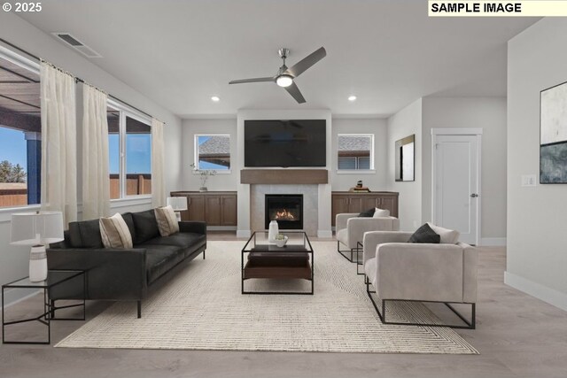 3831 S Arwana Ln, Ridgefield, WA 98642 - living area with baseboards, plenty of natural light, a ceiling fan, and visible vents